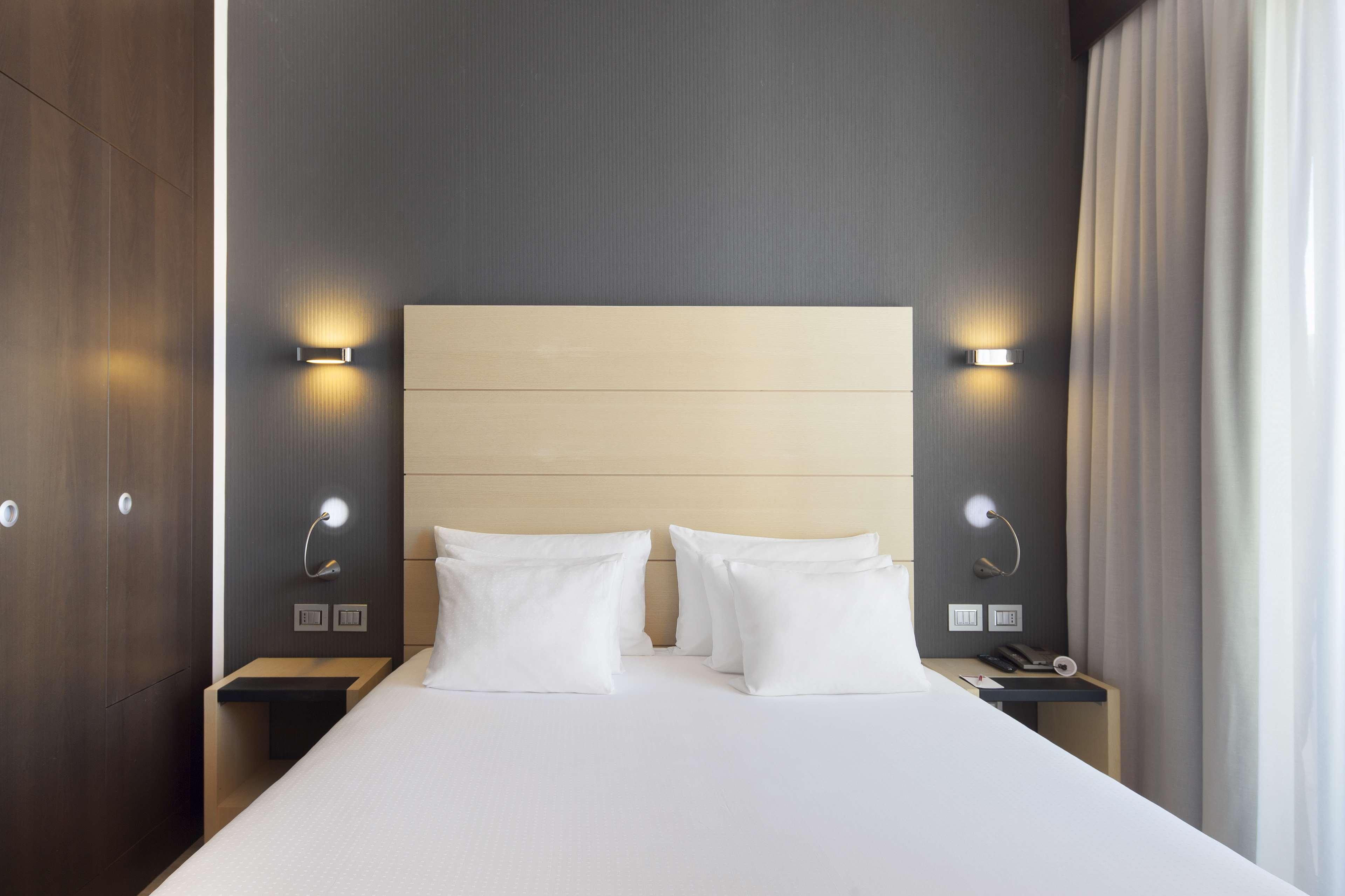 فندق إن إتش كوليكشن ميلانو بريزيدنت المظهر الخارجي الصورة A room at the hotel